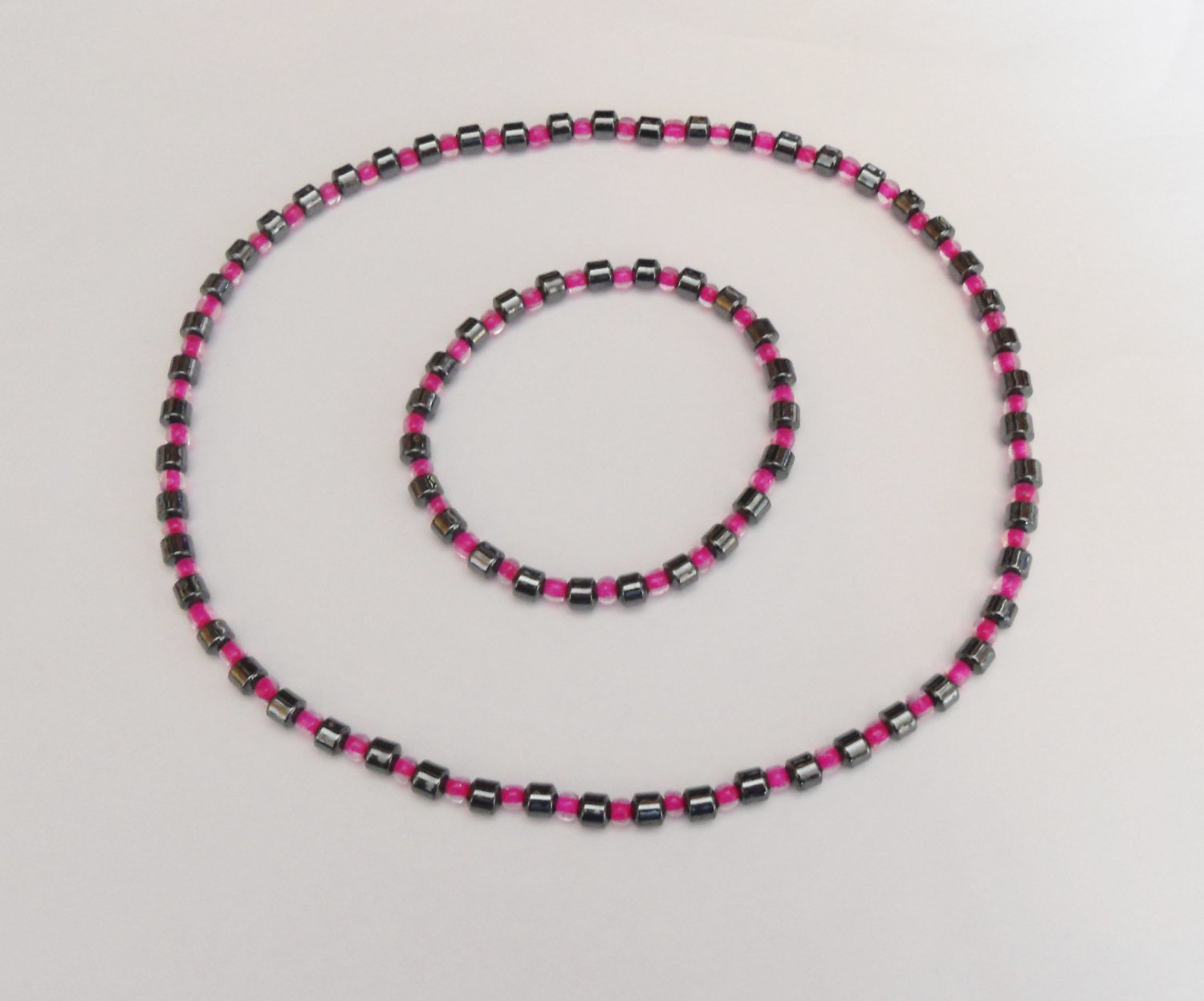 Hematite and clear dark pink surfer set