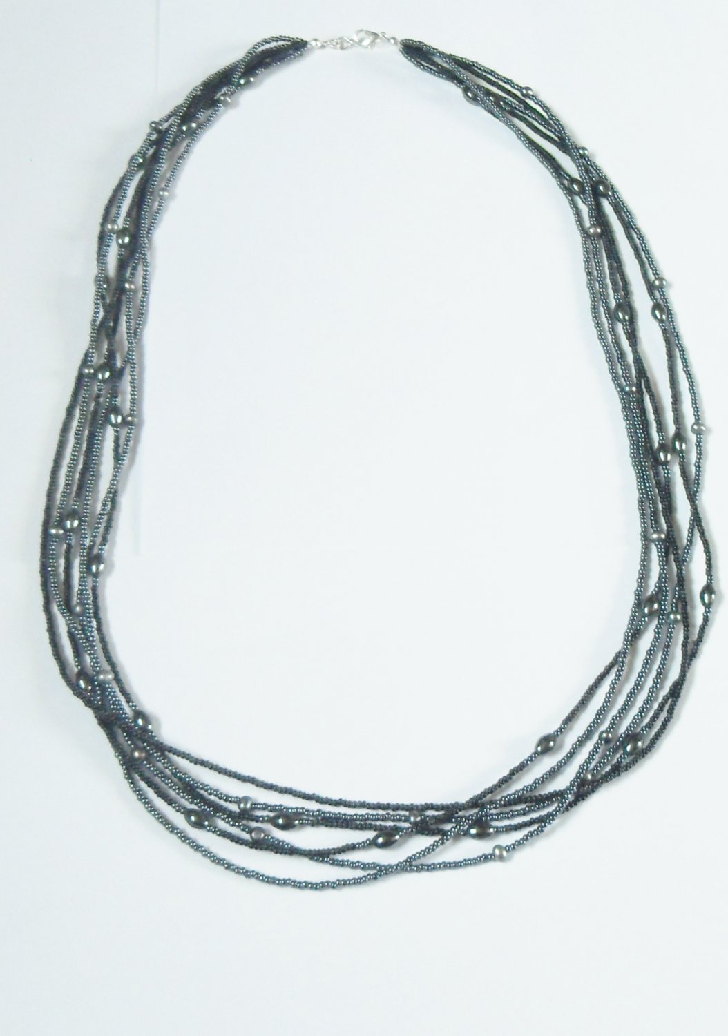 Multi strand hematite and black bead necklace