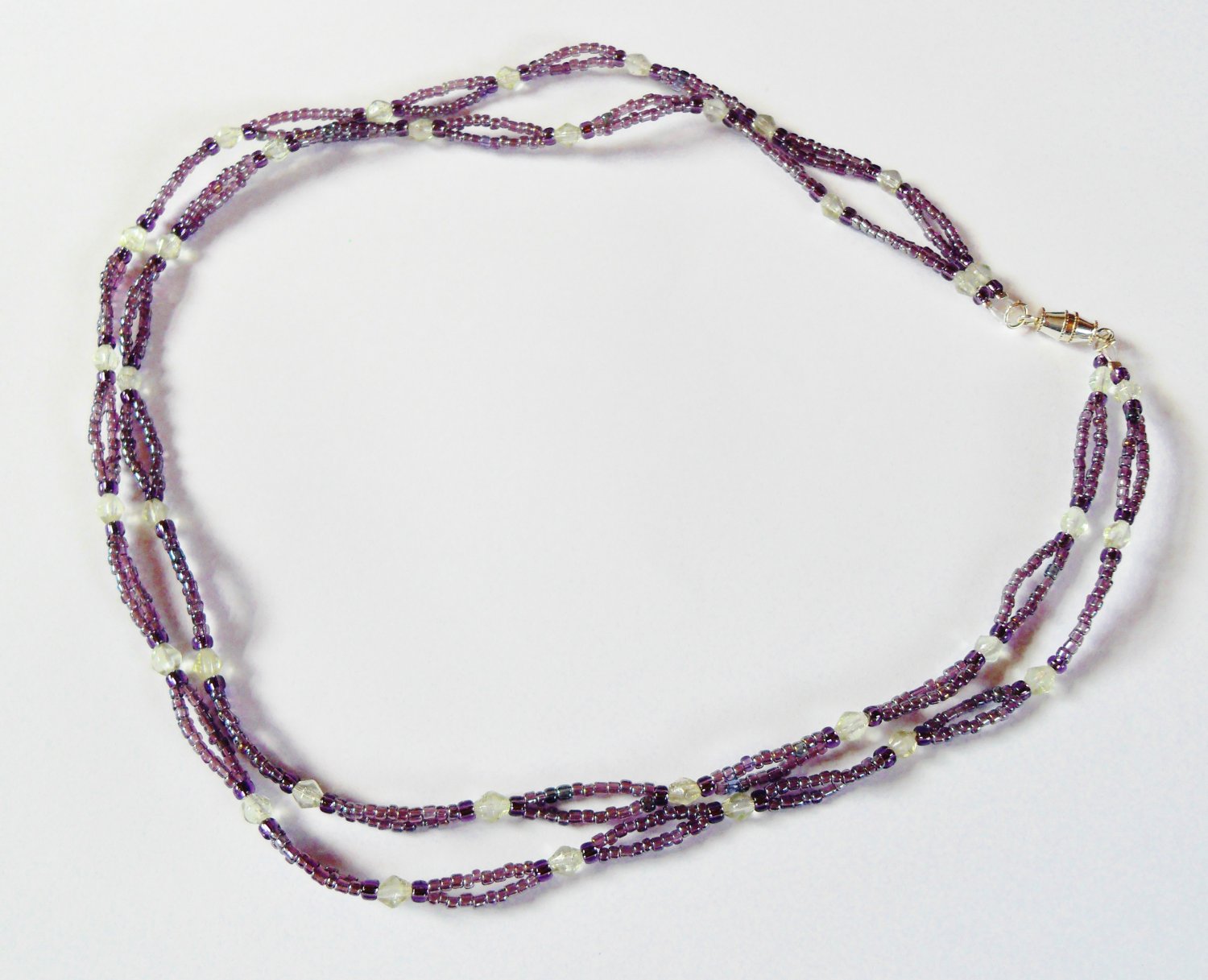 Double stranded light purple and light green necklace