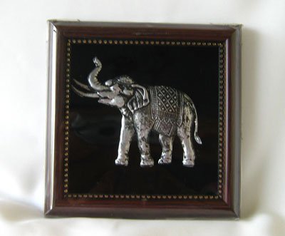 Elephant nickel in wood frame