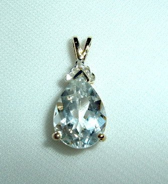 Bautiful White Topaz Pendant set with gold over silver