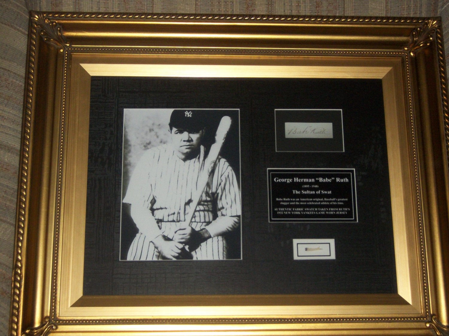 Babe Ruth autographed display and swatch of AUTHENTIC 1932 uniform framed