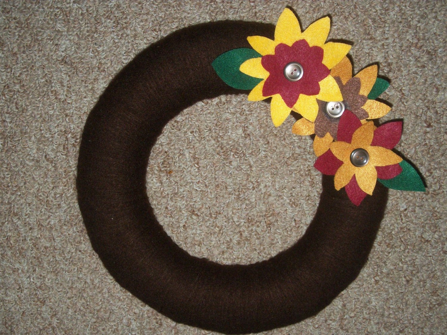 Hand made wreath with decorative flowers