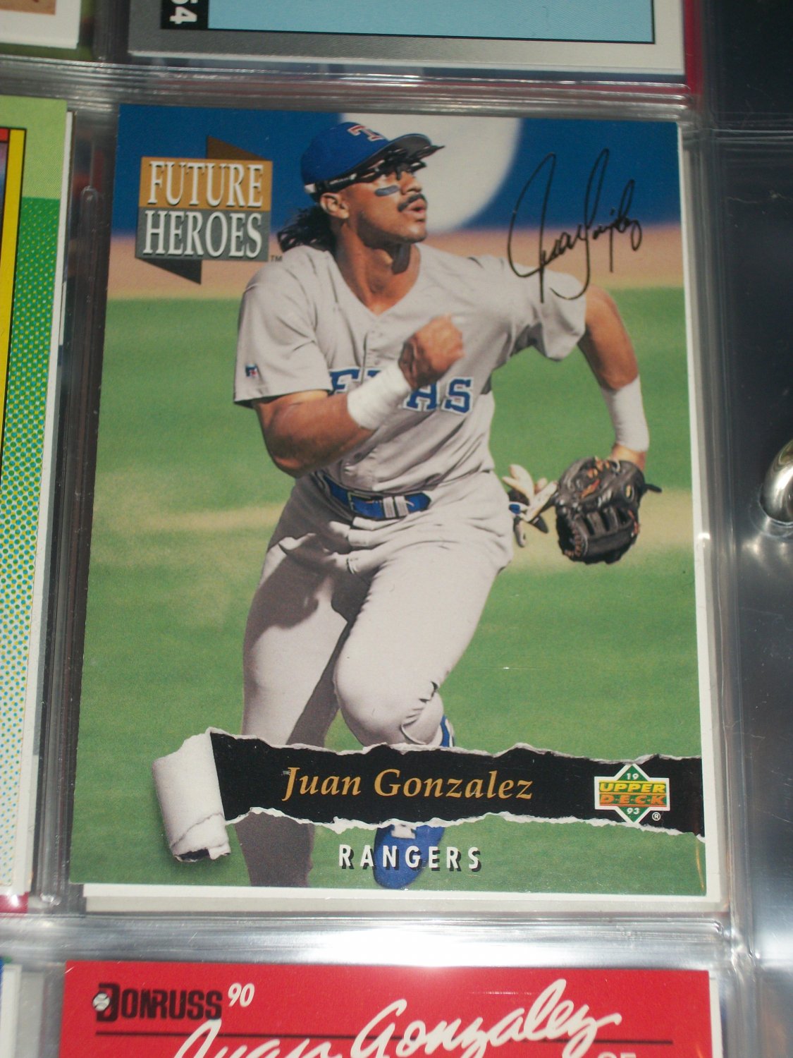 Juan Gonzalez 93 Upper Deck baseball card- Future Heroes with gold signature