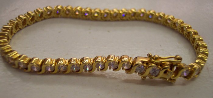 Goldtone CZ Tennis Bracelet With Safety Clasp 680-70