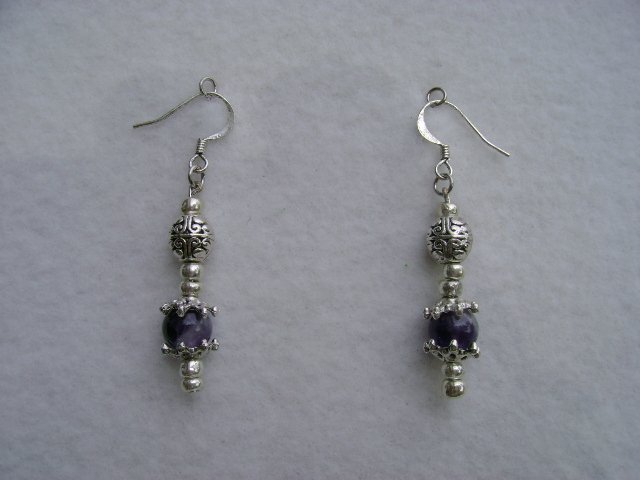 Purple Stone in Silver Caps