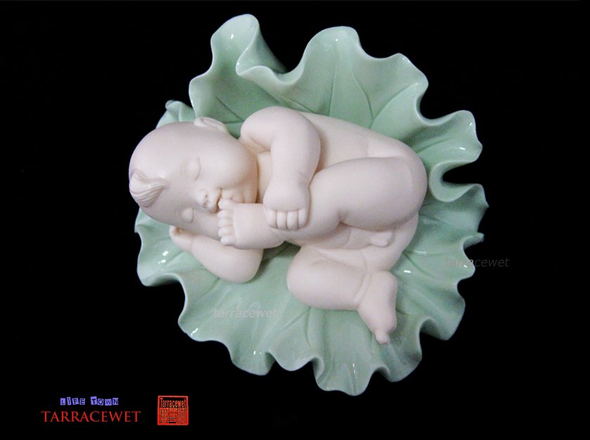 Set Of Fine White Porcelain "Lotus Baby" Figures