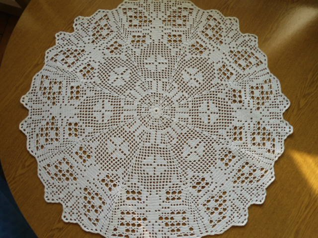 White crocheted doily with Butterflies
