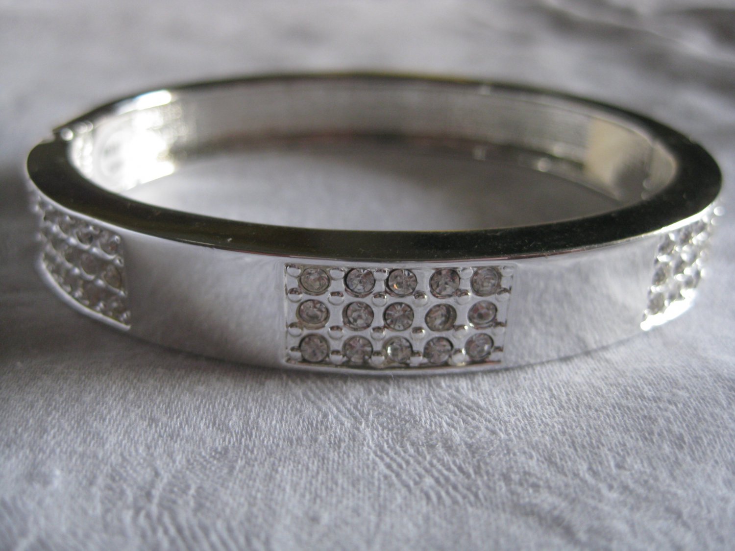 silver cuff with rhinestones columns