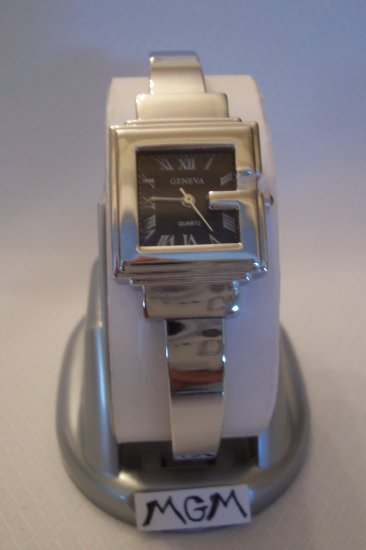 Woman watch with black square face