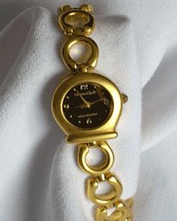Women's Gold Tone Bracelet Watch With A Black Face