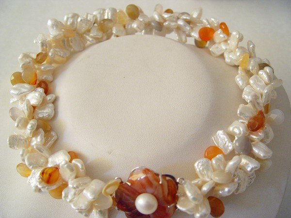 3 strands white Biwa pearl with a red agate clasp