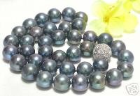 $4900 Amazing 10.5-11mm round black pearls Necklace