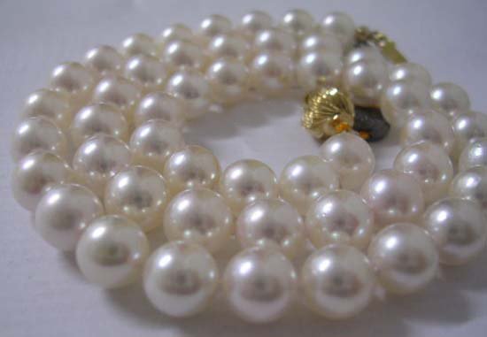 $6000 AAA 6.5-7MM WHITE SEA PEARL 14K