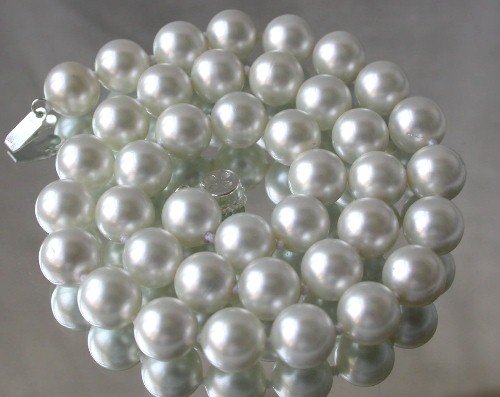Graceful 10mm white Seashell pearl silver clasp