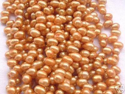 wholesale 20 strand 6-7mm potato shape fw pearl-orange