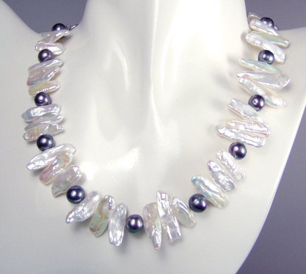 white biwa and black pearl necklace