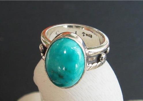 Turquoise ring 15mm on sterling silver holder