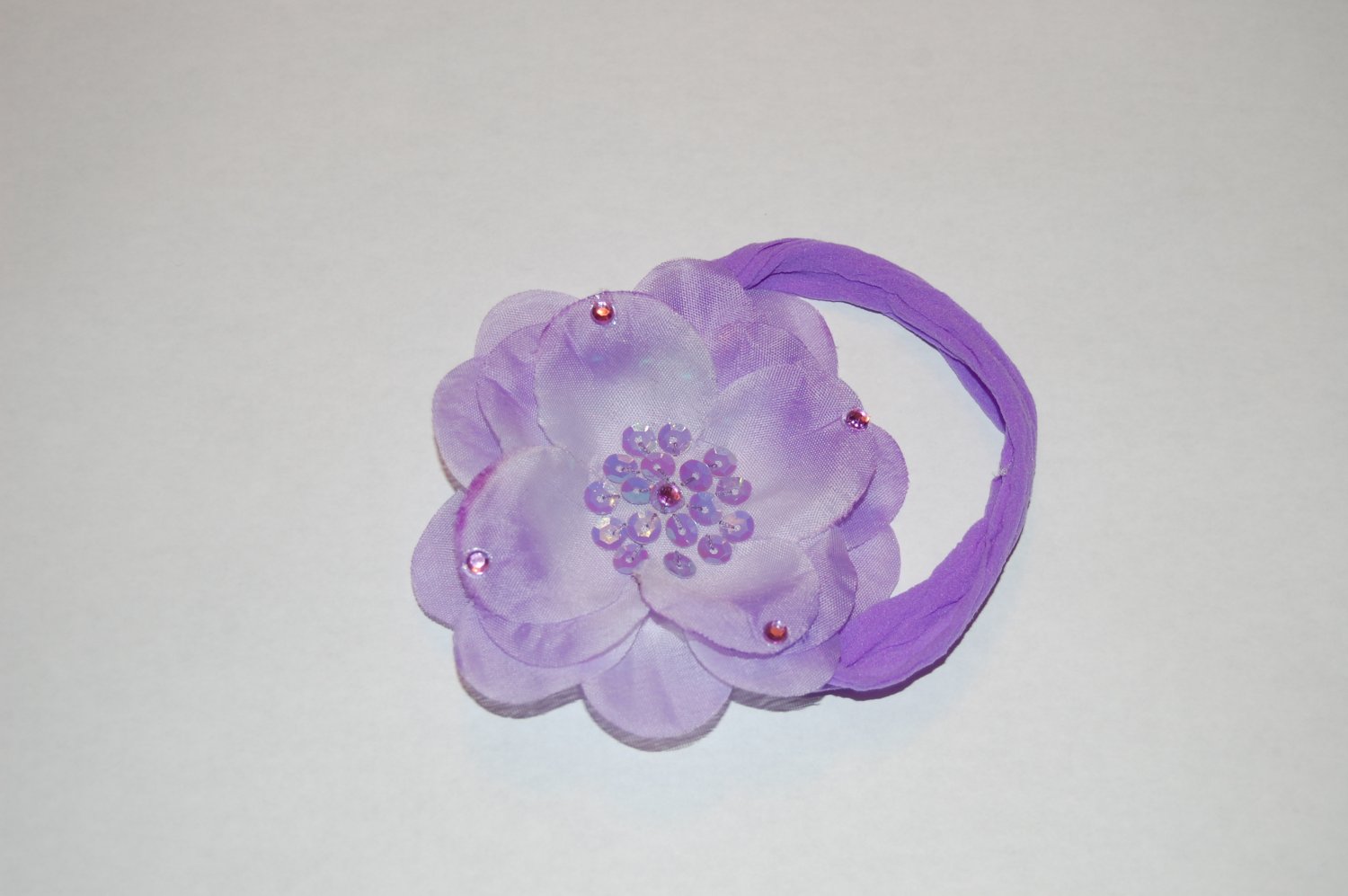 4" Lilly jeweled, lavender Clip with free interchangeable headband.