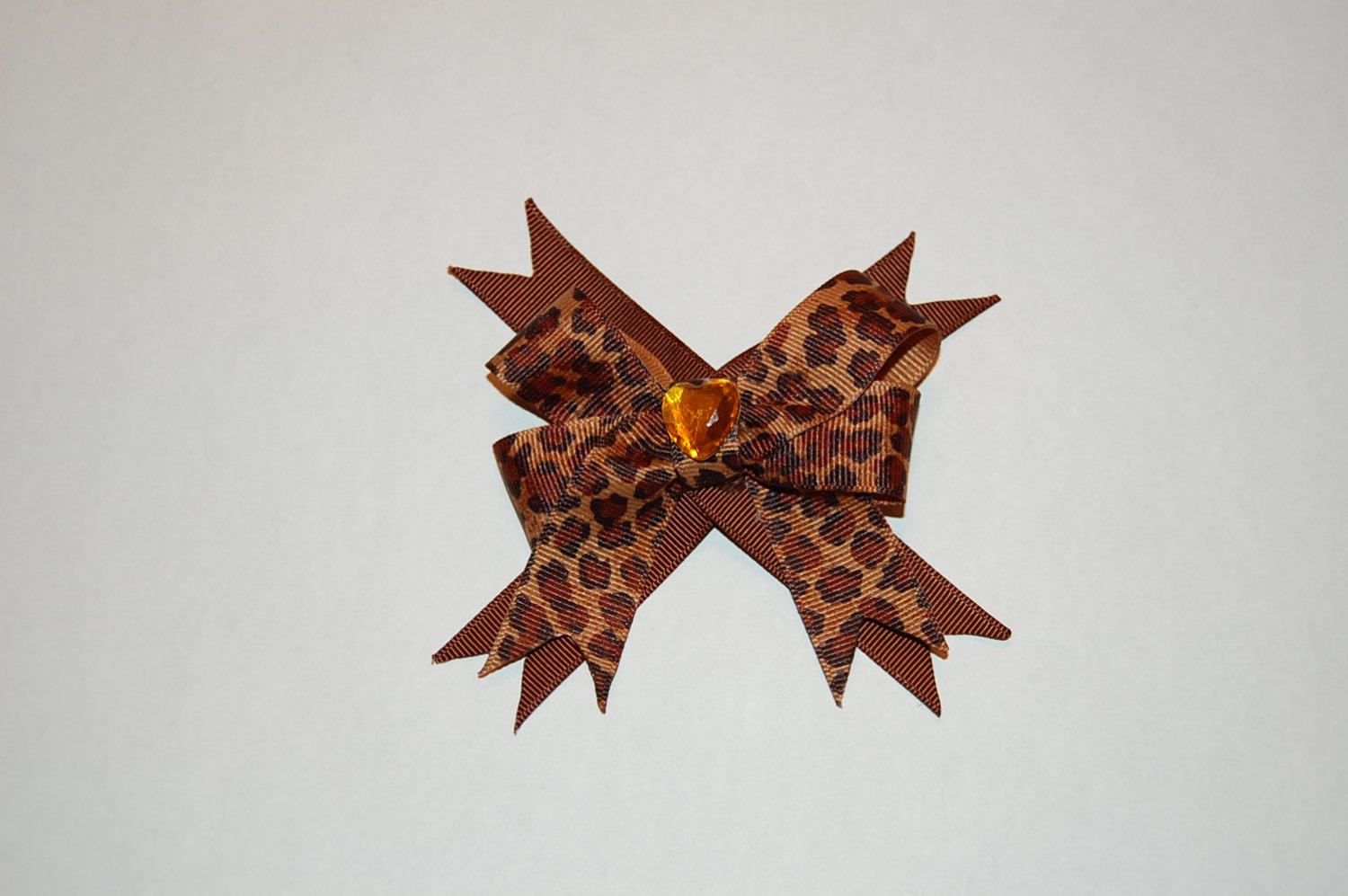 Layered Animal Print Bow with Spikes-Brown Leopard