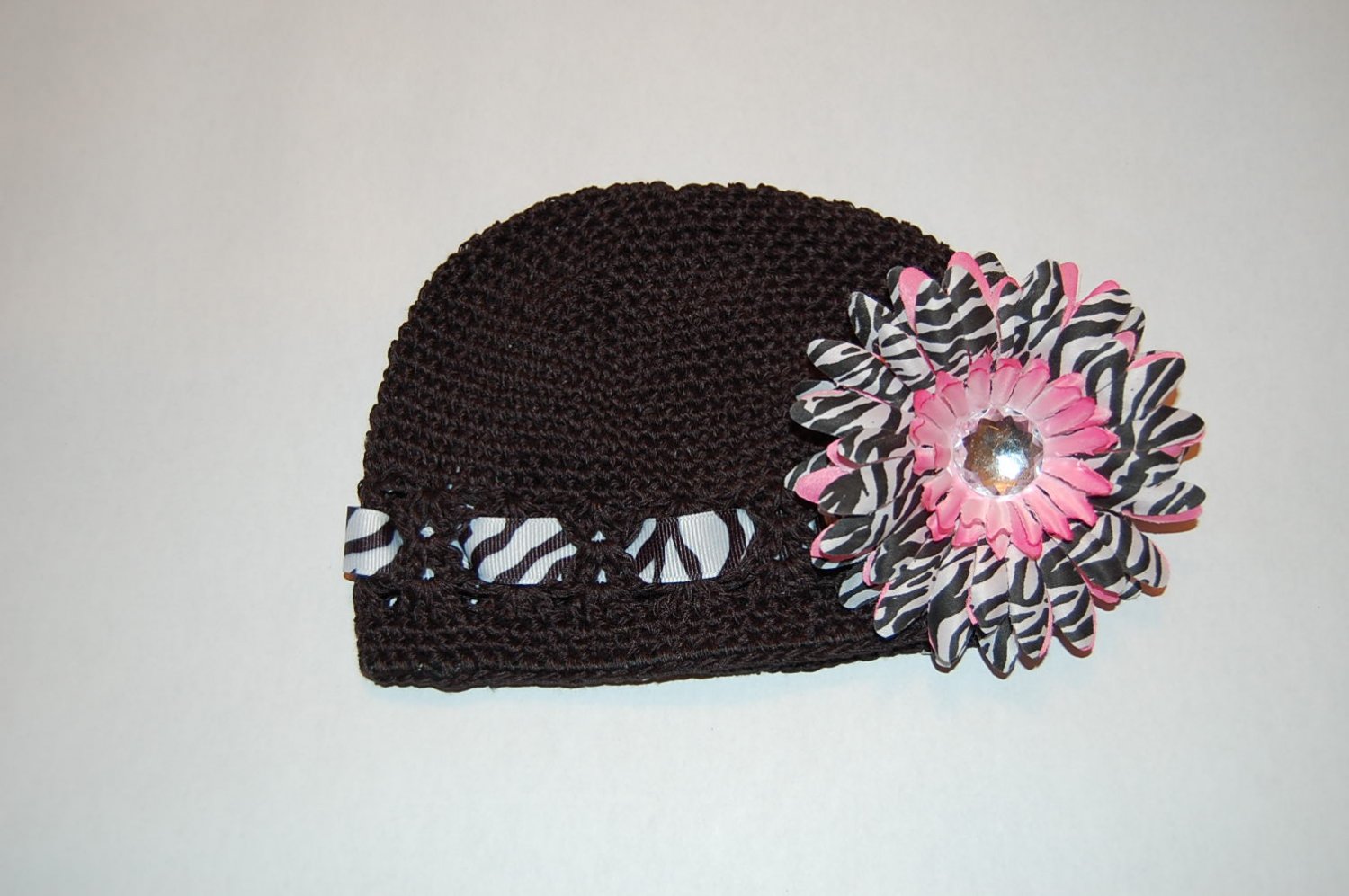 Crocheted Kufi Hat, Black, Zebra Ribbon Accent,Pink Zebra Daisy . Sizes NB, SM, MED, LGE !