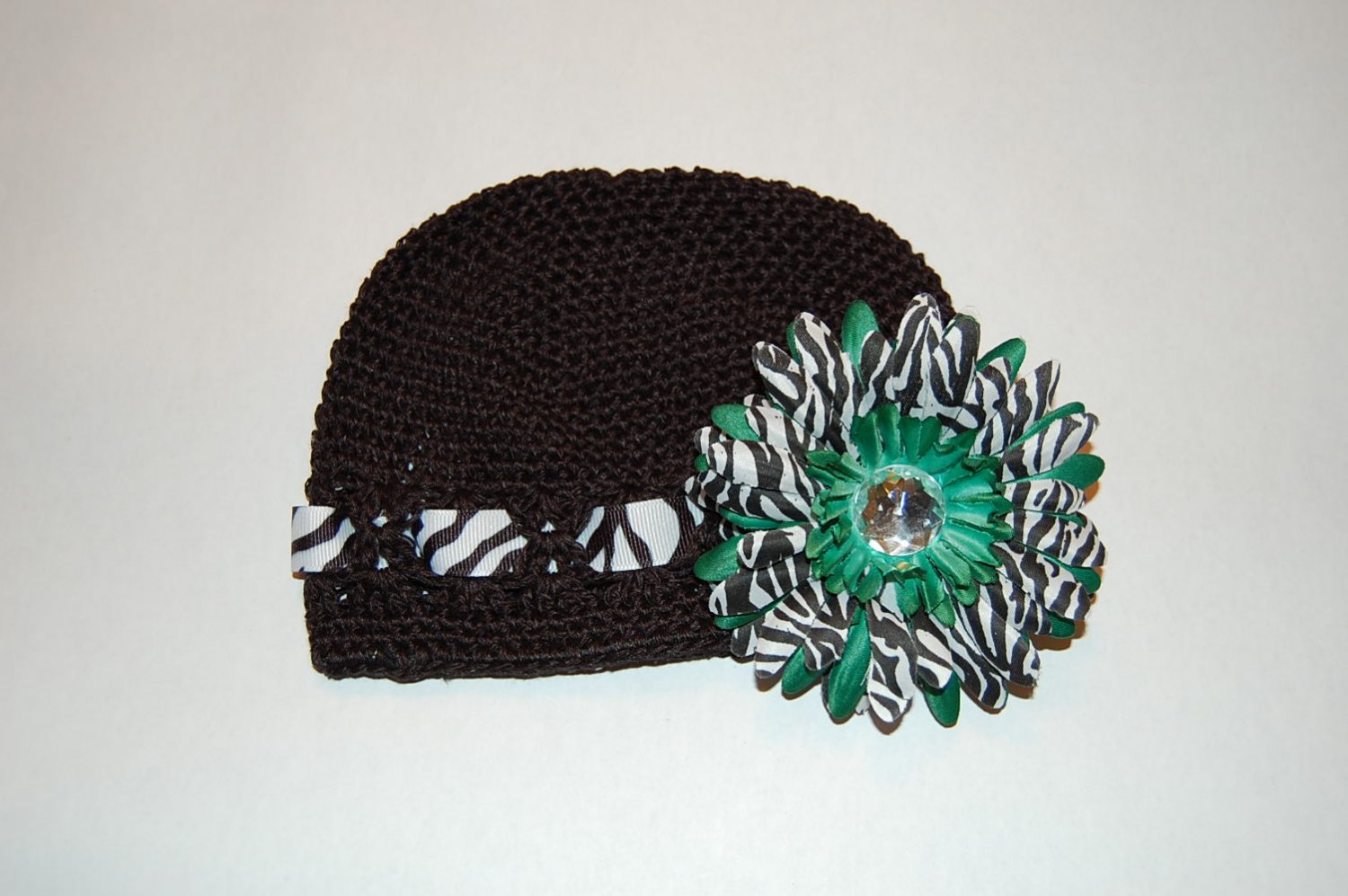 Crocheted Kufi Hat,Black, Zebra Ribbon Accent, Green Zebra Daisy . Sizes NB, SM, MED, LGE !
