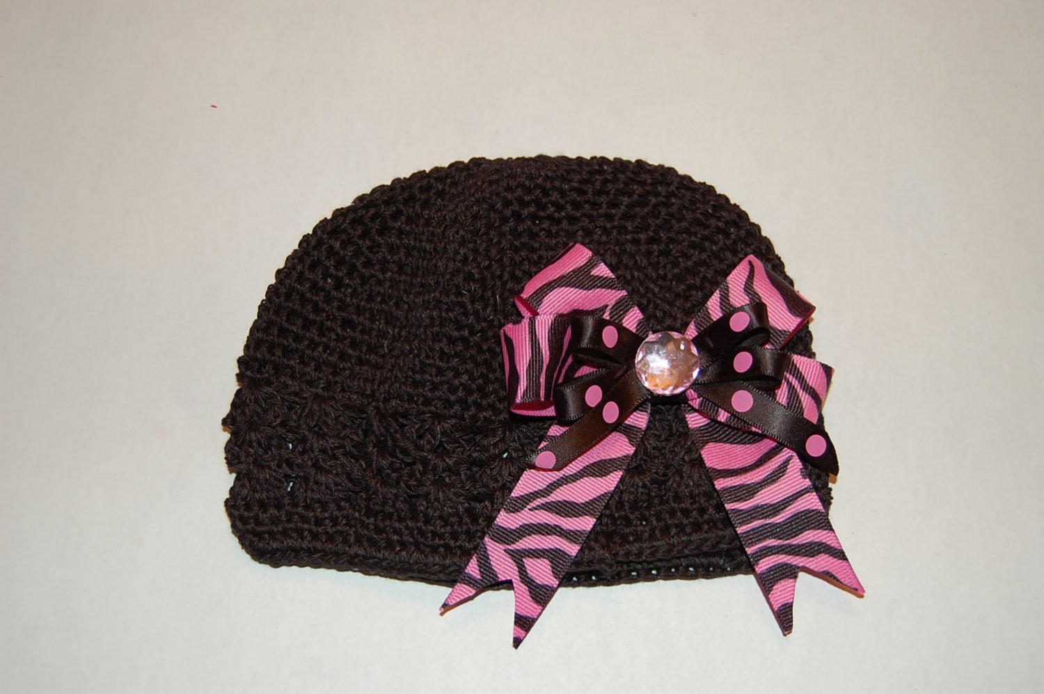 Crocheted Kufi Hat,Black, Pink Zebra Layered Bow . Sizes NB, SM, MED, LGE