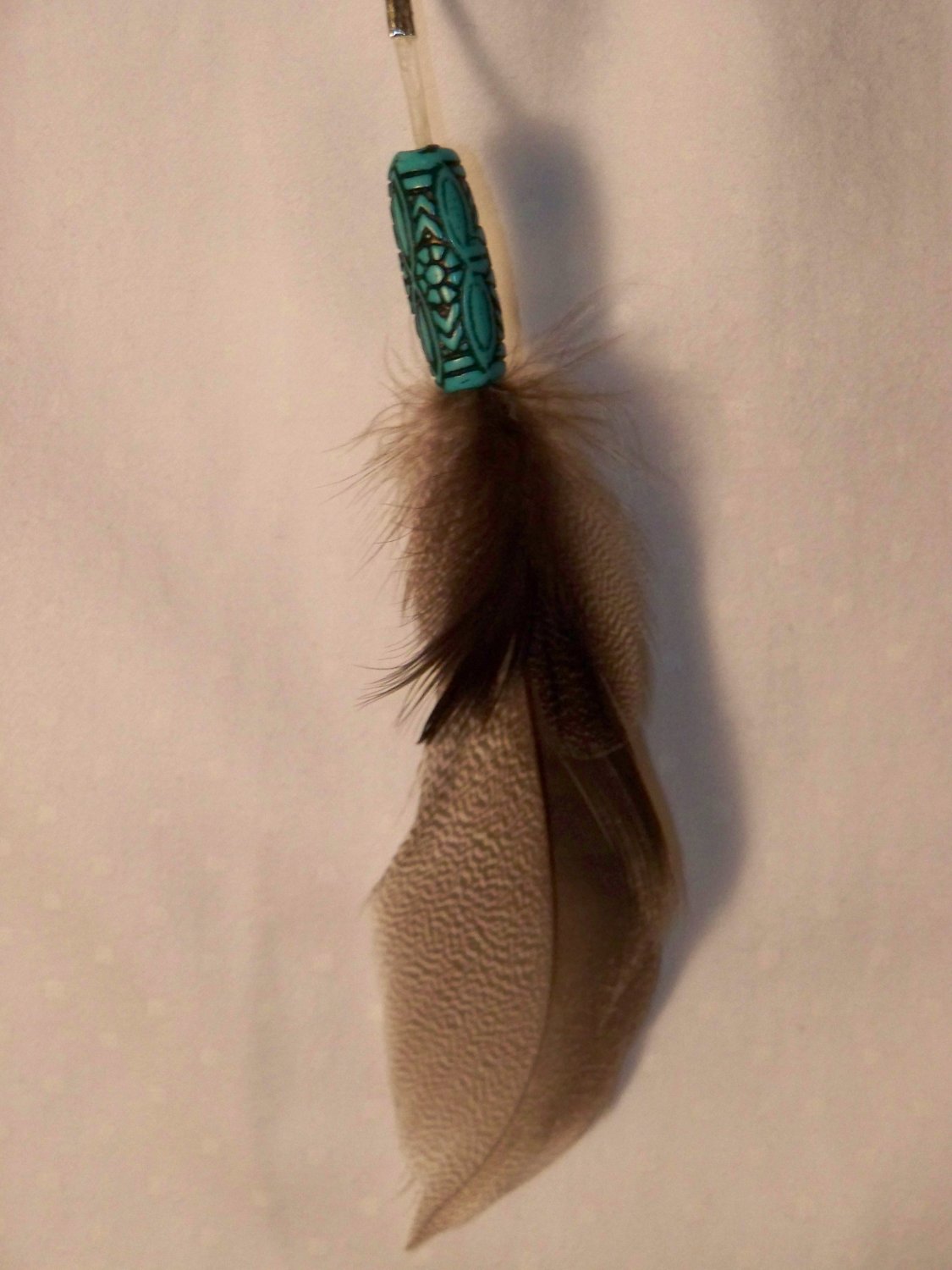 One beaded 2 Feather Earring