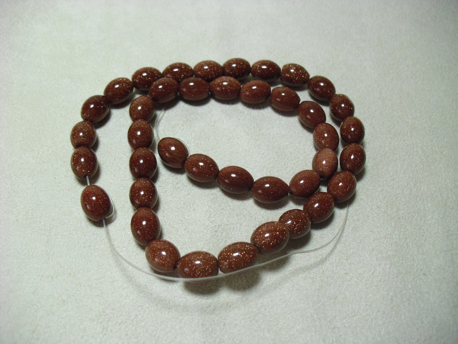 Oval Brown Goldstone Beads