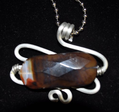 Silver Pendant with Deep Brown Stone
