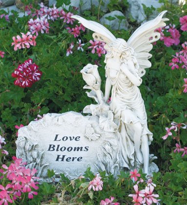 Love Blooms Here Sign