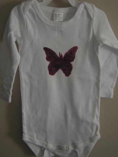 Butterfly stenciled onesie