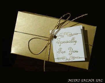 Gold box with card