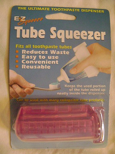 NEW EZ TUBE SQUEEZER TOOTHPASTE DISPENSER/ROLLER MESS !
