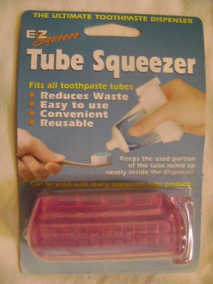 NEW EZ TUBE SQUEEZER TOOTHPASTE DISPENSER/ROLLER MESS !