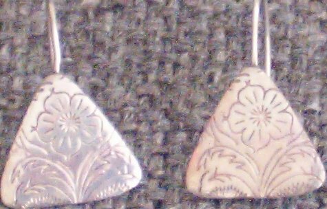Silver Earings With Flower Imprint Design
