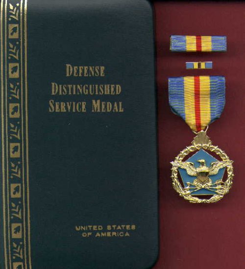 US Defense Distinguished Service medal in case with ribbon bar and lapel pin