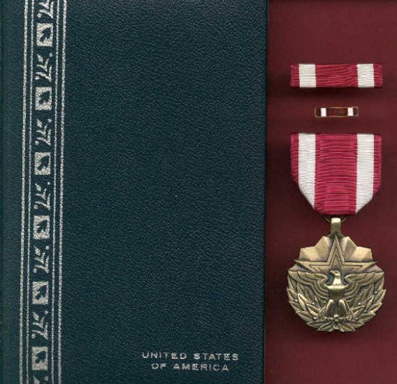 US Meritorious Service Award medal in case with ribbon bar and lapel pin