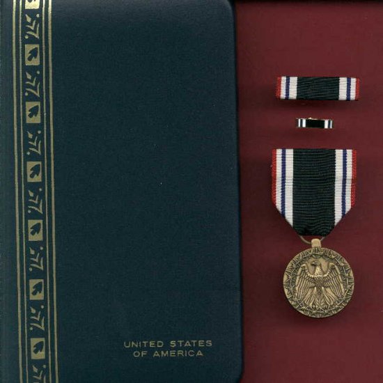 US Prisoner of War POW medal in case with ribbon bar and lapel pin