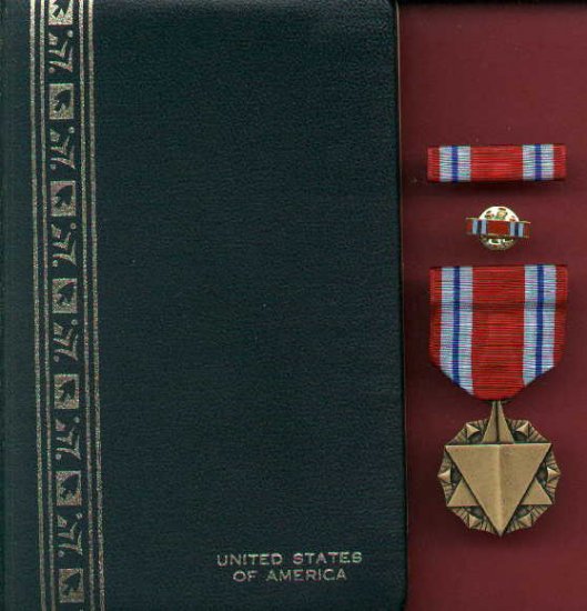 US Combat Readiness medal in case with ribbon bar and lapel pin