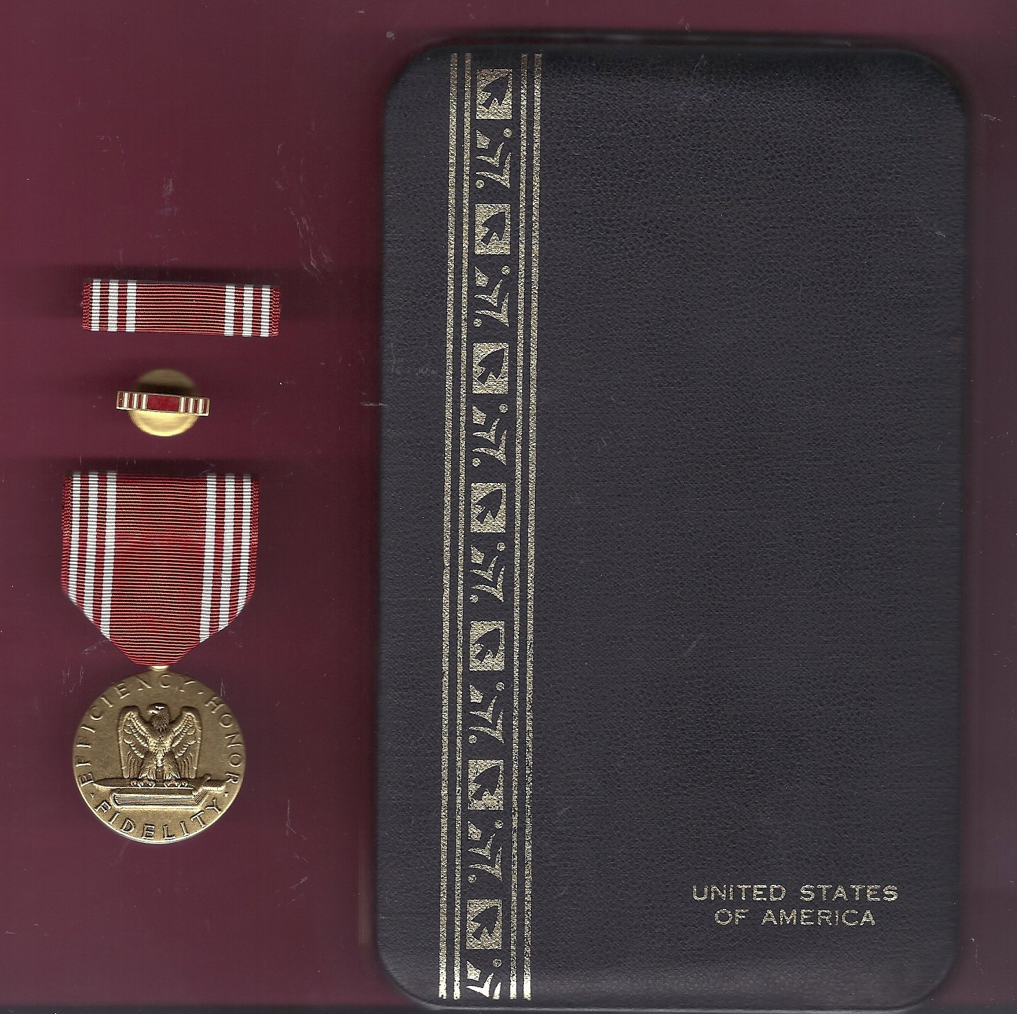 US Army Good Conduct medal in case with ribbon bar and lapel pin
