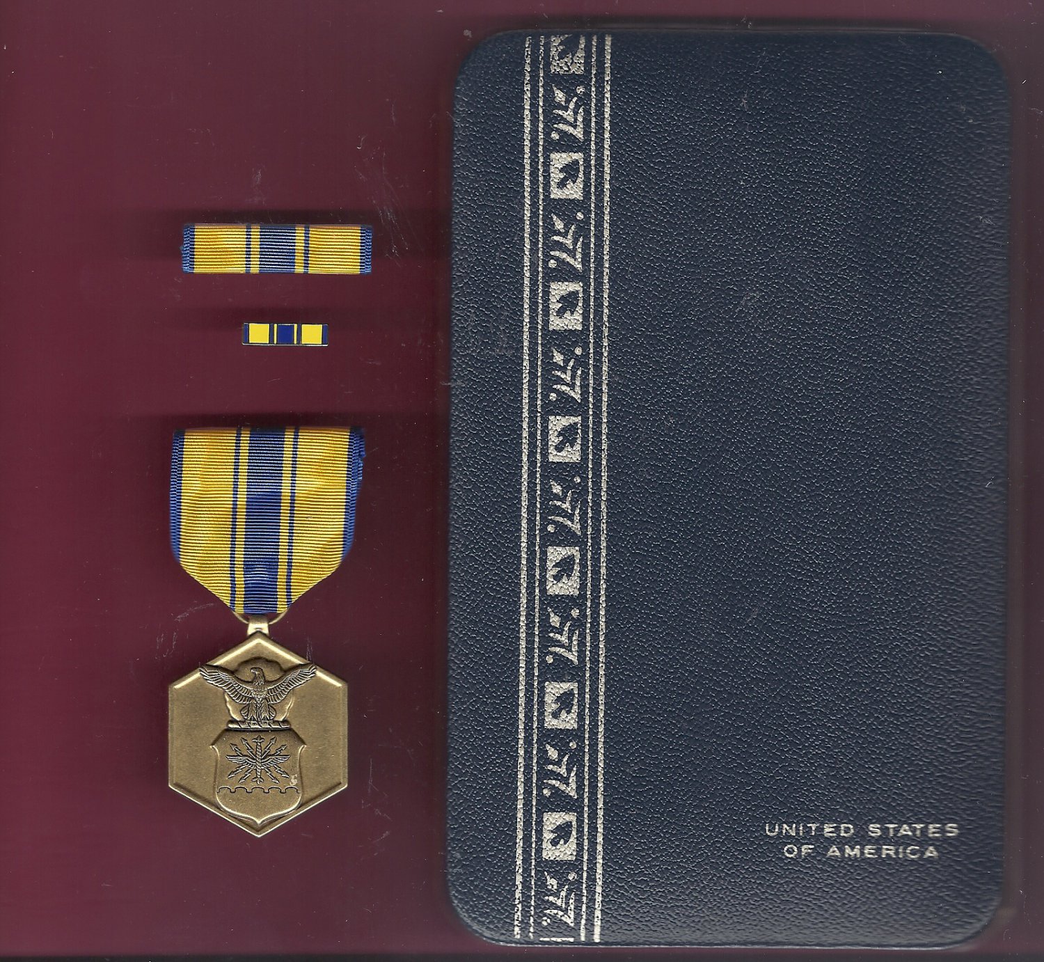 Air Force Commendation medal in case with ribbon bar and lapel pin