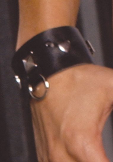Leather wrist cuffs with square nail heads and O rings