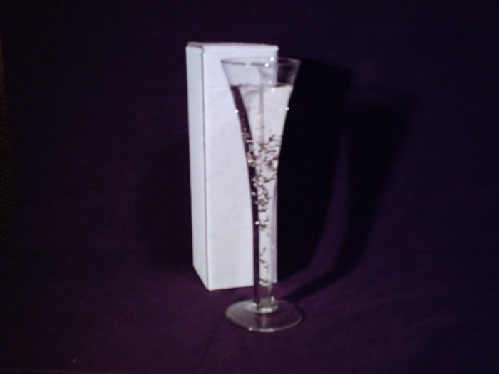 Tall champagne glass gel candle with silver & gold flakes