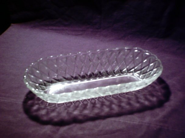 Large clear glass basket with pebbled and woven design