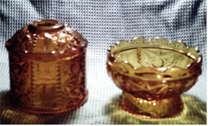 Beautiful heavy 2 piece amber cut glass candle holder