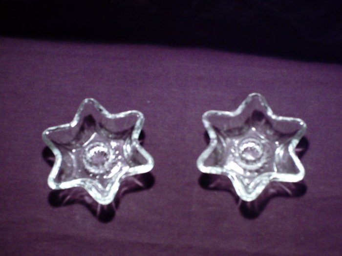 Star shaped cut glass taper candle holders