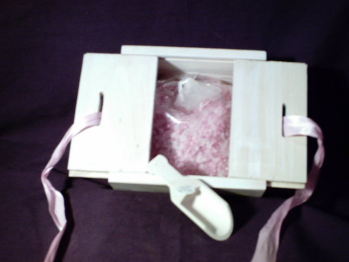 Collectible box with bath salts, pink ribbon and wooden scoop