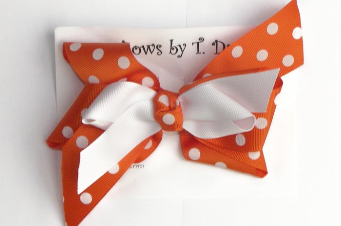 ORANGE WITH WHITE POLKA DOTS HAIR BOW