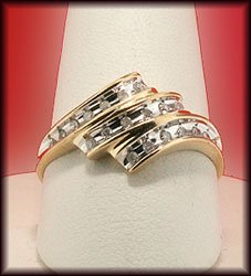 10K GOLD , 1/4 CARAT DIAMOND RING